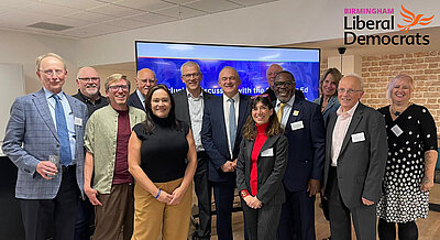 A group of Birmingham campaigners, led by Ed Davey, leader of the Party.