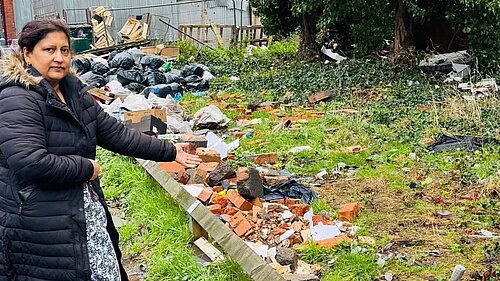 Aston Councillor Mumtaz Hussain pointing to a fly-tipping crisis in her ward
