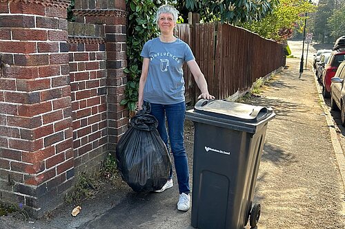 Moseley Councillor Izzy Knowles with bins 