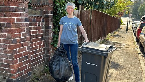 Moseley Councillor Izzy Knowles with bins 